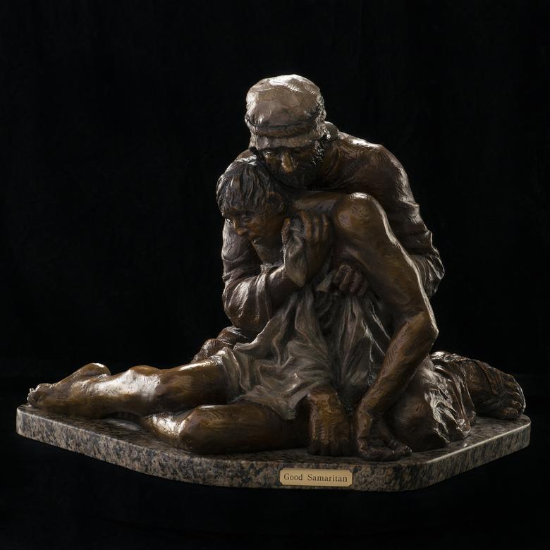 A bronze sculpture by Allen Jay Haroldsen depicting the Good Samaritan.