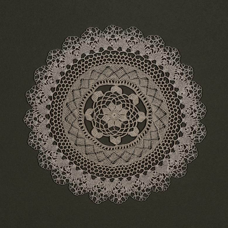 An Armenian needle lace artwork by Karoun Elizabeth Arslanian, depicting how the gospel binds her family together.